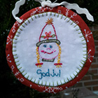 </p>
<p><center><a href="http://rosebudscottage.typepad.com/rosebuds_cottage/2012/11/aurifil-designer-christmas-blog-hop-god-jul-tomte.html" target="_blank">Roseann Kermes</a></center>